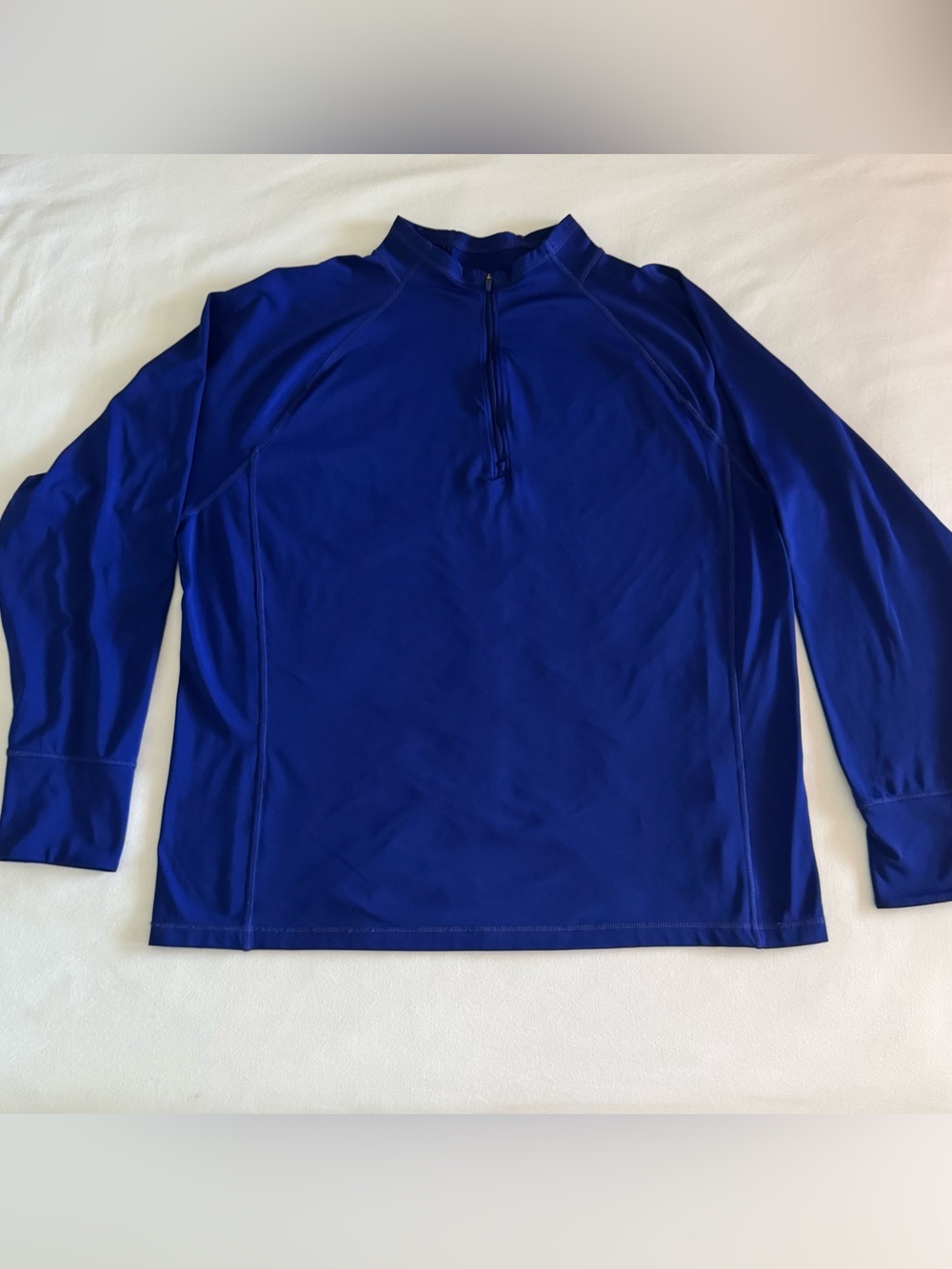The North Face men's XL long sleeved thick dri-fit top in royal blue. EUC.